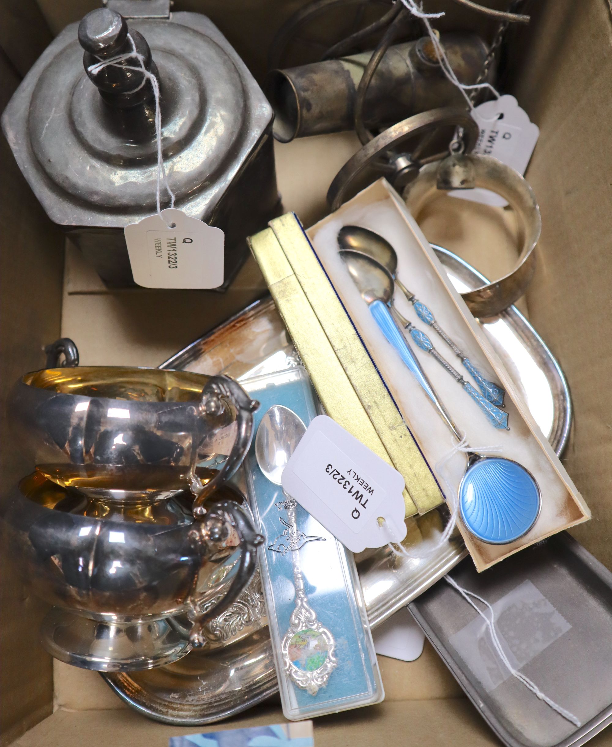 Three enamelled silver spoons (one pair), other spoons, a pair of silver pin trays, a white metal bangle and sundry plated items